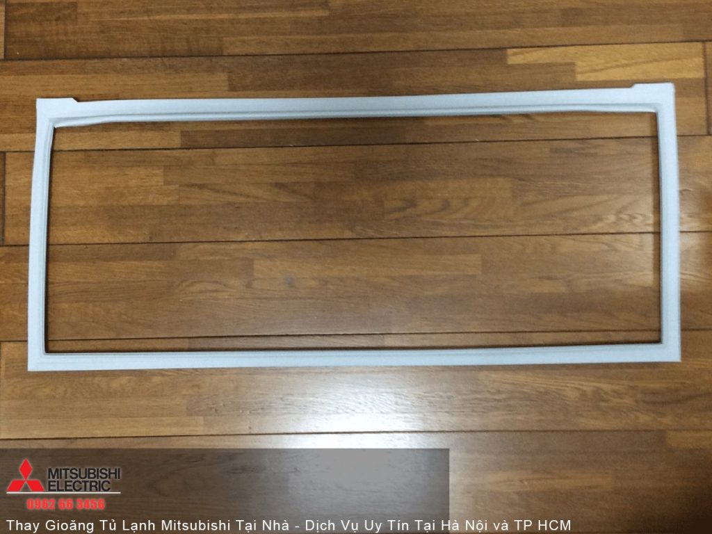 Refrigeration door frame for Mitsubishi air conditioning units, made of durable white plastic. Suitable for home and commercial air conditioning maintenance and installation.