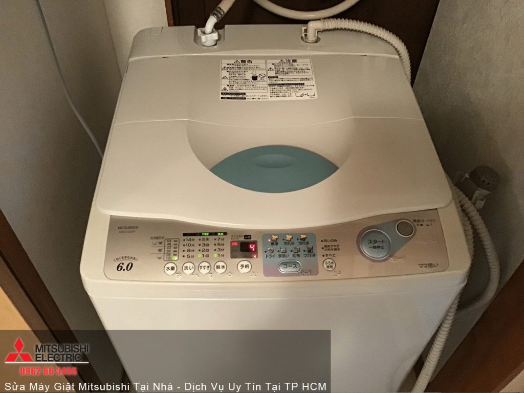High-efficiency Mitsubishi washing machine with digital controls and multiple washing programs for reliable laundry care.