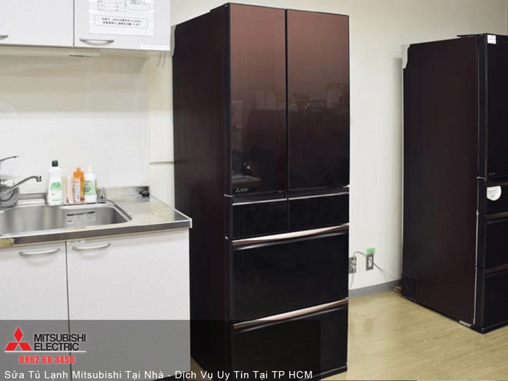 Refrigerators in a modern home kitchen, showcasing Mitsubishi Electric appliances, clean design, and sleek black finish ideal for reliable cooling solutions.
