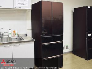 Refrigerators in a modern home kitchen, showcasing Mitsubishi Electric appliances, clean design, and sleek black finish ideal for reliable cooling solutions.